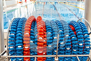 Swimming lanes markers in reel storage, near the pool. Pool lane lines for athletics, swimming