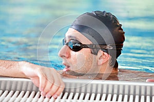 Swimming - male swimmer resting