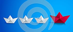 Swimming origami ship leading the team group of smaller ships, business leadership concept, vector modern style 3d realistic