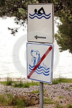 Swimming Permitted sign. No dog allowed sign on sea beach. No dog sign and pets. Forbidden symbol allowed sign prohibited dogs.