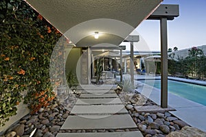 Swimming Pool Along Modern House