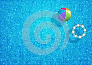 Swimming pool background with beach ball and rubber ring