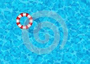 Swimming pool background with striped rubber ring floating on the surface