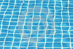 swimming pool with blue mosaic background