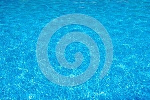 Swimming pool blue water surface texture