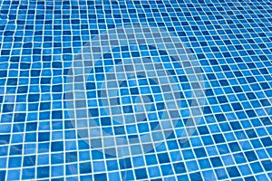 Swimming pool bottom with clear water surface textured background