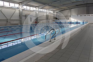 Swimming pool with clean water in the sports complex for athletes young and old