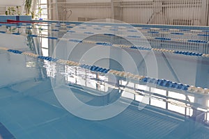 Swimming pool with clean water in the sports complex for athletes young and old