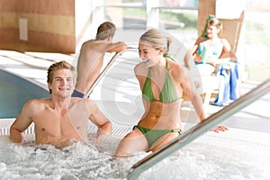 Swimming pool - couple relax in hot tub