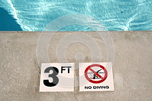 Swimming pool depth marker