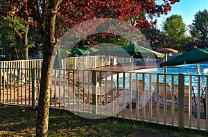Swimming pool with fence