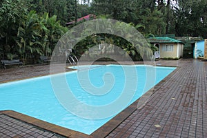 Swimming pool filled with cool blue water