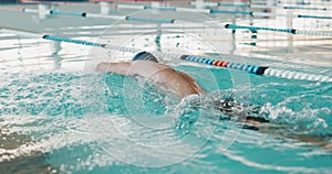 Swimming pool, fitness and swimmer in professional, gym and race lines for competition as athlete in training. Aquatic