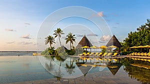 Swimming pool at Four Seasons Resort Maldives at Kuda Huraa