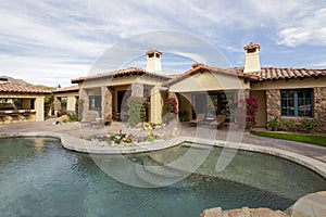 Swimming pool in front of luxurious mansion