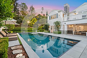 Swimming pool in front of a new construction home in Encino, California