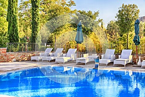 Swimming pool in the garden, Italy