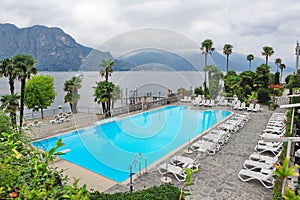 Swimming pool of a grand hotel facing Lake Como in Italy