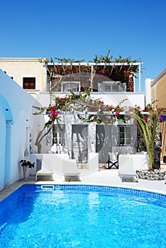 Swimming pool of hotel in traditional Greek style