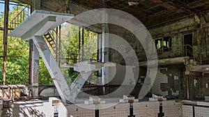 Swimming pool inside destroyed abandoned building House of Culture Energetik