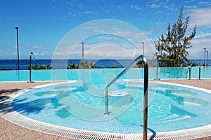 Swimming pool with jacuzzi at luxury hotel