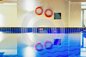 Swimming pool with life rings