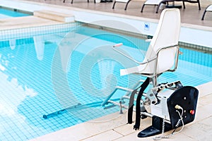 Swimming pool lifts for disabled people access to the pool.