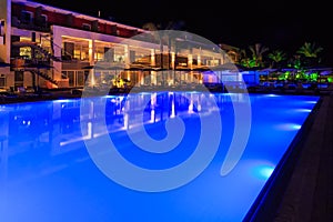 Swimming pool with lighting in the spa modern European hotel at night