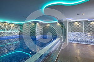 Swimming pool in luxury hotel spa center