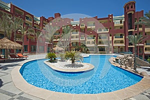 Swimming pool in luxury tropical hotel resort