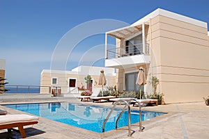 Swimming pool at the modern luxury villa photo