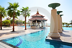 The swimming pool near beach in Thai style hotel