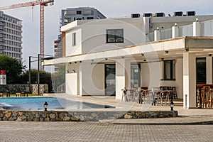 swimming pool near a cafe in a residential complex 1