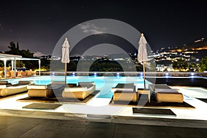 Swimming pool in night illumination at the luxury hotel