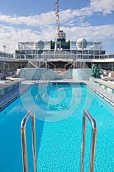Swimming pool onboard Crystal Serenity cruise ship open deck