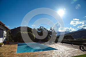 A Swimming Pool outside a Beautiful Country House on a Summer Day - Itaipava, Rio de Janeiro, Brazil