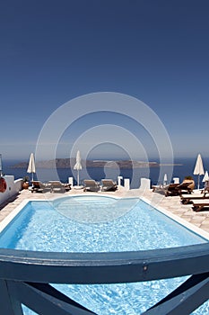 Swimming pool over sea santorini