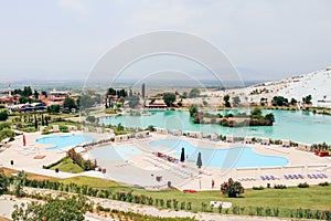 Swimming pool and Pamukkale town in Turkey