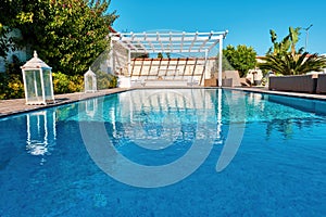 Swimming pool and patio of a residential Aegean or Mediterranean villa