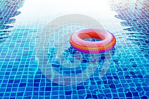 Swimming Pool Ring Float over Blue Water