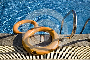 A swimming pool and a rubber safety ring