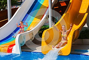 Swimming pool slides for children on water slide at aquapark.