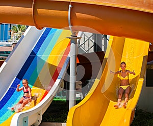 Swimming pool slides for children on water slide at aquapark.