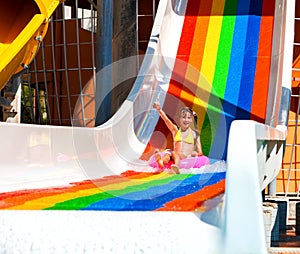 Swimming pool slides for children on water slide at aquapark.