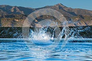 Swimming pool splash