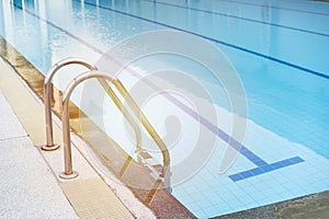 Swimming pool with stair in a building, sport concept