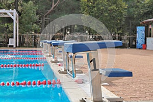 Swimming pool with starting blocks. Sport facility