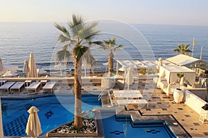 Swimming pool on summer sea resort, Crete, Greece.