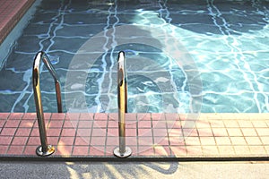 Swimming pool in summer time
