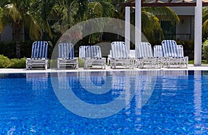 Swimming pool with sun lounger in Cuba